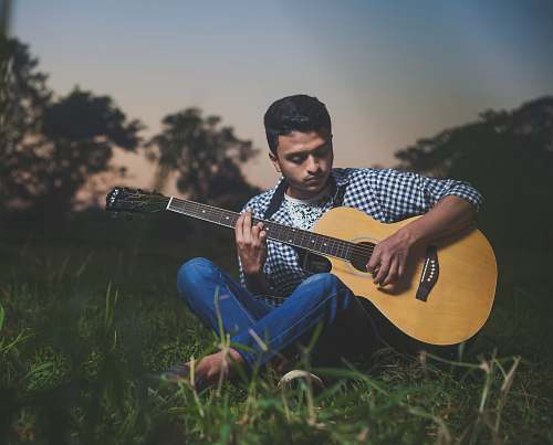 person man playing guitar human