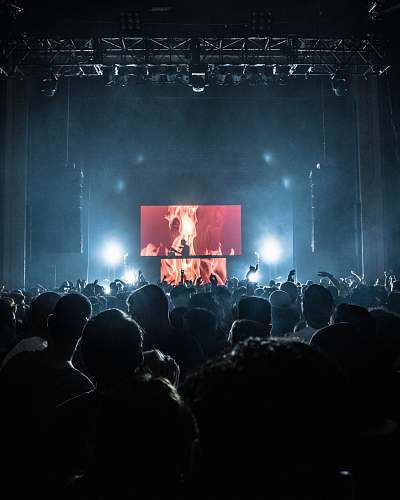 crowd band performing on stage concert