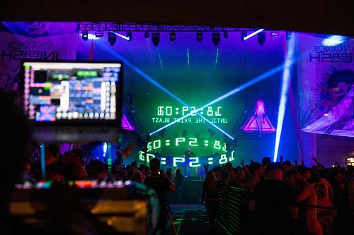 music crowded concert event with timer of 18:59:01 stage