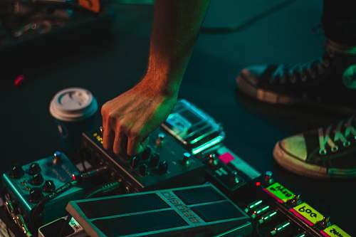 person man DJ controller dj
