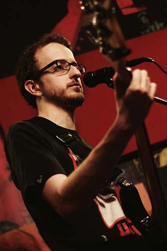 person man playing guitar photography musician