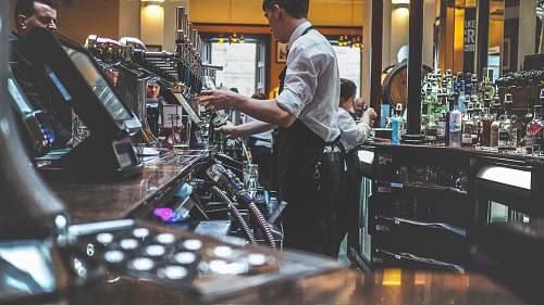 person man preparing beverage drink in bar people