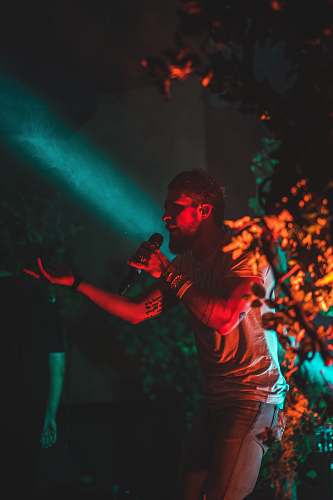person man using microphone club