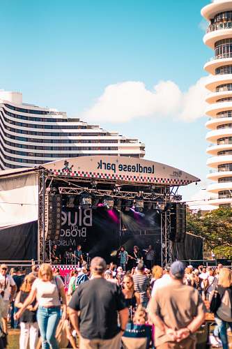 person people at Lendlease park having concerts during daytime crowd