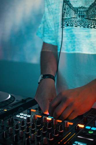 person person using DJ mixer chess