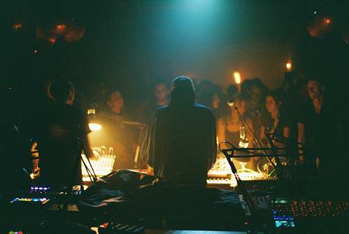 person poeple in room dj