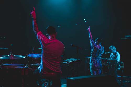 people two person raising hands person