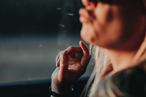 person woman in vehicle finger
