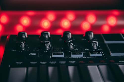 computer black audio mixer turned on with red lights computer hardware