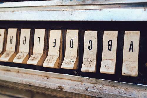 maco close up photography of brown jukebox letter keys davao