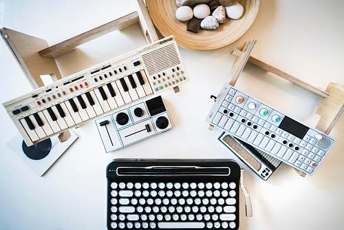 desktop assorted music toy on table keyboard