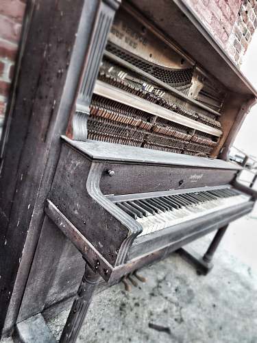 grey black and brown upright piano west bottoms