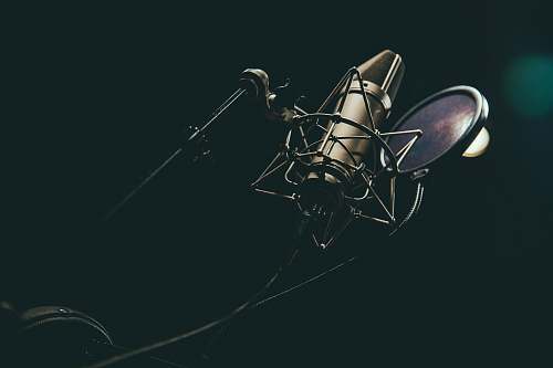 microphone bokeh photography of condenser microphone grey