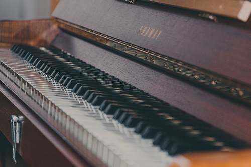 piano brown wooden spinet piano musical instrument