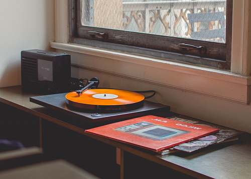 vintage gray turntable playing los angeles