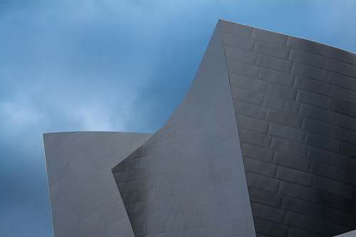concert low angle photography of grey concrete building audience