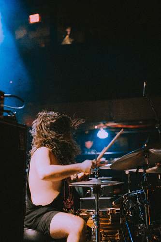 musician man playing drum set on stage drummer