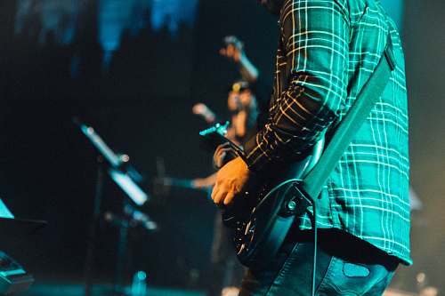 guitarist person playing electric guitar guitar