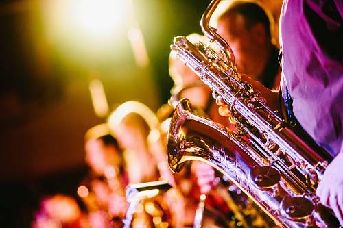 human person playing saxophone person