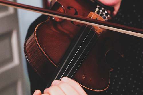cello person playing violin leisure activities