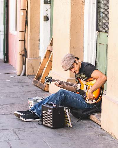 guitar photo of man playing electric guitar musician