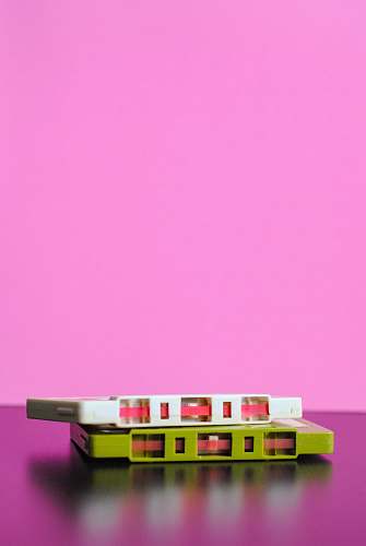 pink white and green cassette tapes retro