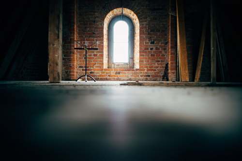 sweden low-angle photo of concrete wall and window arch