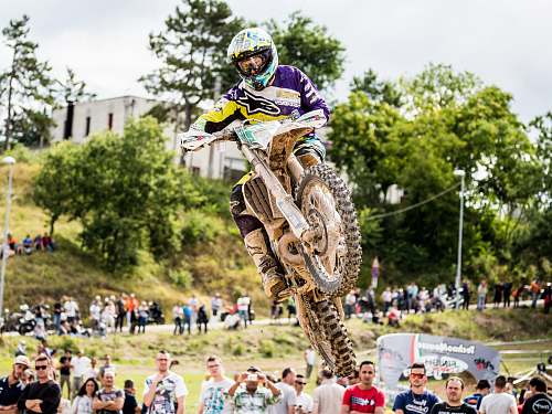 person man riding motocross dirt bike human