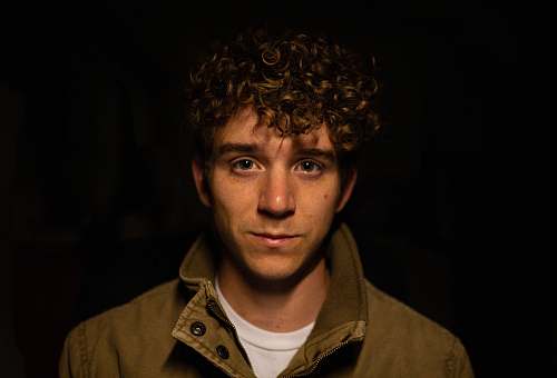human man wearing brown collared top person