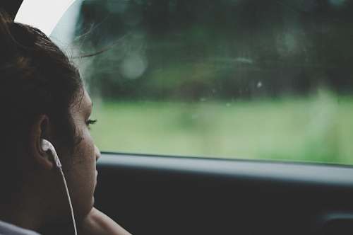 person person wearing white earphones human
