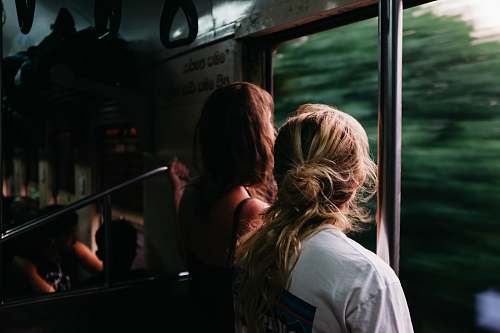 person two person standing on train window human