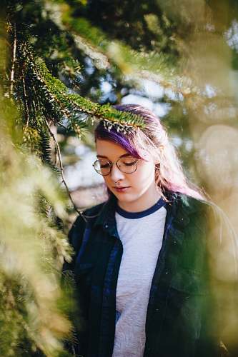 human woman standing near tree person