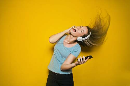 human woman wearing white headphones person