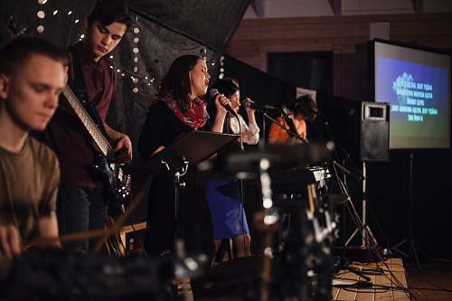 human band performing on stage people