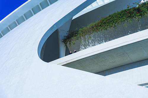 architecture high-angle photography of white rooftop building