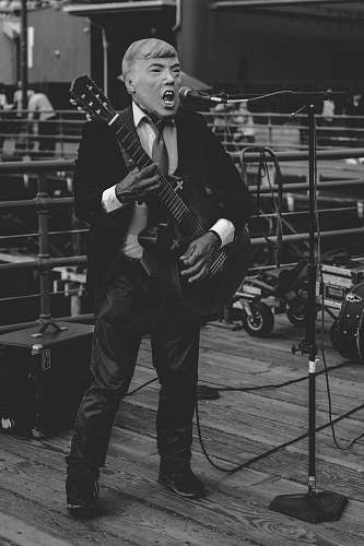 guitar man holding guitar black-and-white