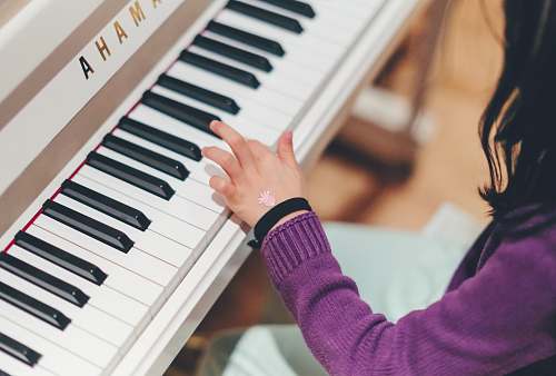 human person playing piano people