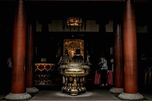 human temple with post and altar people