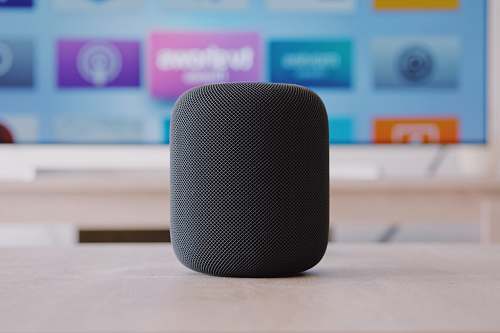 loudspeaker black Apple HomePod speaker on table electronics