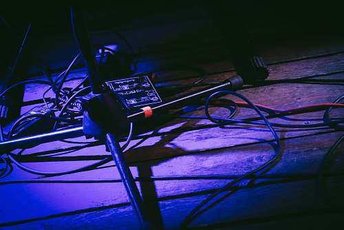bike low-light photo of black microphone stand bicycle