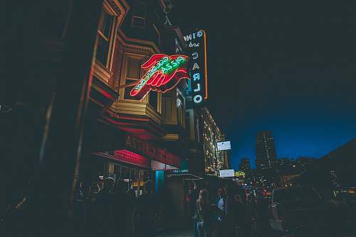 neon Calro neon signage under black sky san francisco