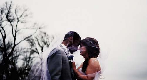 human bride and groom facing each each other photo wedding