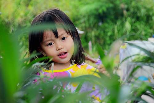 girl girl surrounded by plants leaf