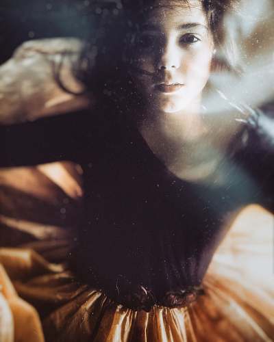 person girl wearing black and brown dress photo human