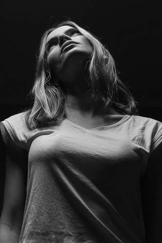 black-and-white grayscale photo of a woman with shirt woman