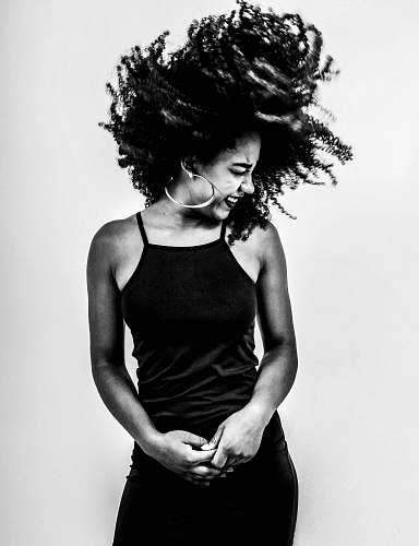 person grayscale photo of woman black-and-white