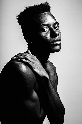 black-and-white grayscale photography of man portrait