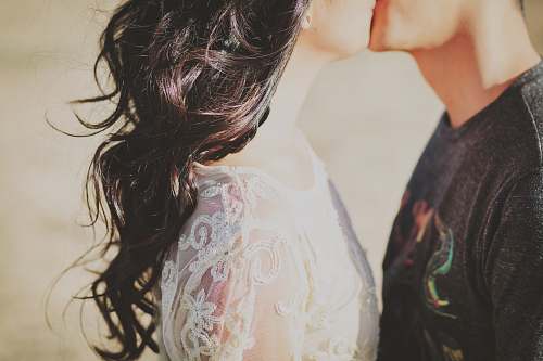person man kissing woman love
