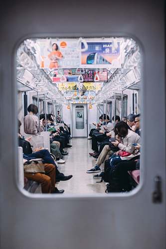 person people at the train looking at their phones japan