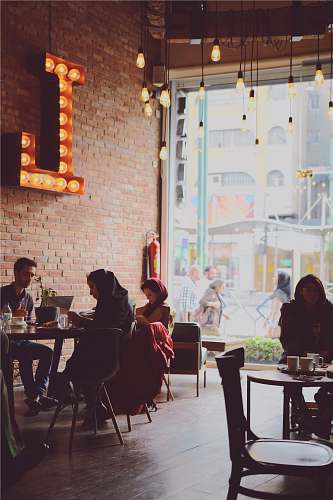 person people sitting in coffee shop human
